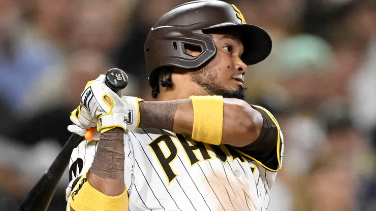 Luis Arraez #4 of the San Diego Padres hits a double in the eighth inning against the Pittsburgh Pirates.