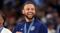 Gold medalist Stephen Curry of Team United States smiles on the podium