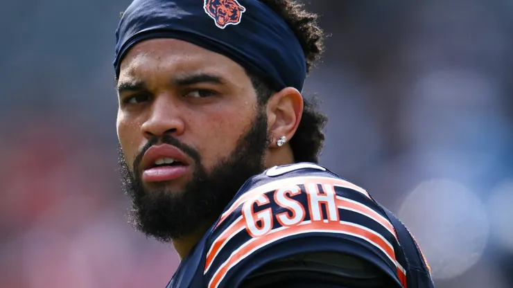 Caleb Williams #18 of the Chicago Bears warms up before the game against the Tennessee Titans at Soldier Field on September 08, 2024 in Chicago, Illinois.
