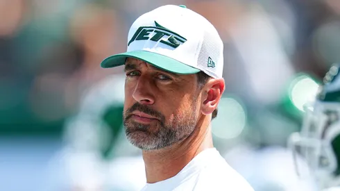 Aaron Rodgers of the New York Jets looks on prior to the preseason game against the Washington Commanders at MetLife Stadium on August 10, 2024 in East Rutherford, New Jersey.