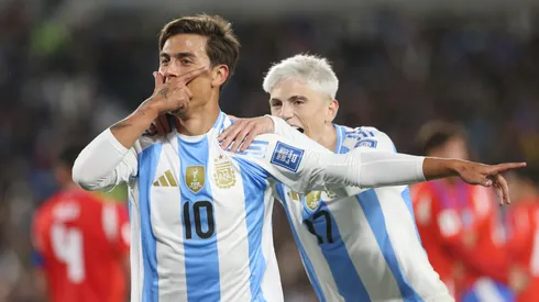 Paulo Dybala of Argentina celebrates after scoring the team's third goal with teammate Alejandro Garnacho during the FIFA World Cup 2026 Qualifier match between Argentina and Chile at Estadio MĂĄs Monumental Antonio Vespucio Liberti on September 05, 2024 in Buenos Aires, Argentina.