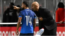 Jason Coronel of Nicaragua with coach Marco Antonio Figueroa