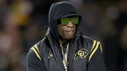 Head coach Deion Sanders of the Colorado Buffaloes walks on the field during pregame against the Stanford Cardinal at Folsom Field on October 13, 2023 in Boulder, Colorado.