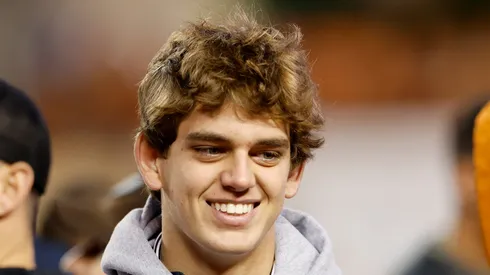 Arch Manning attends the game between the Texas Longhorns and the TCU Horned Frogs at Darrell K Royal-Texas Memorial Stadium on November 12, 2022 in Austin, Texas.