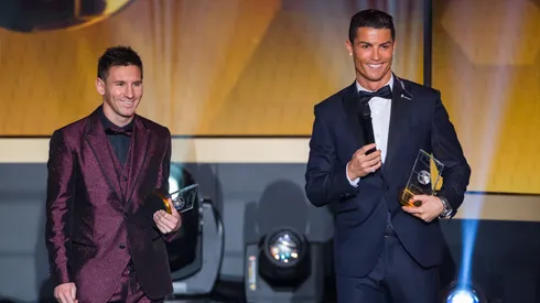 FIFA Ballon d'Or nominees Lionel Messi of Argentina and FC Barcelona (L) and Cristiano Ronaldo of Portugal and Real Madrid smile during the FIFA Ballon d'Or Gala 2014 at the Kongresshaus on January 12, 2015 in Zurich, Switzerland.