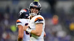 Bo Nix of the Denver Broncos smiles after a touchdown