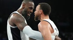 LeBron James #6 and Stephen Curry #4 of Team United States celebrate after their team's win against Team Serbia during a Men's basketball semifinals match between Team United States and Team Serbia on day thirteen of the Olympic Games Paris 2024 at Bercy Arena on August 08, 2024 in Paris, France.