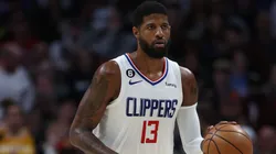 Paul George #13 of the Los Angeles Clippers brings the ball down the court against the Denver Nuggets