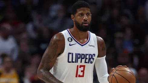 Paul George #13 of the Los Angeles Clippers brings the ball down the court against the Denver Nuggets