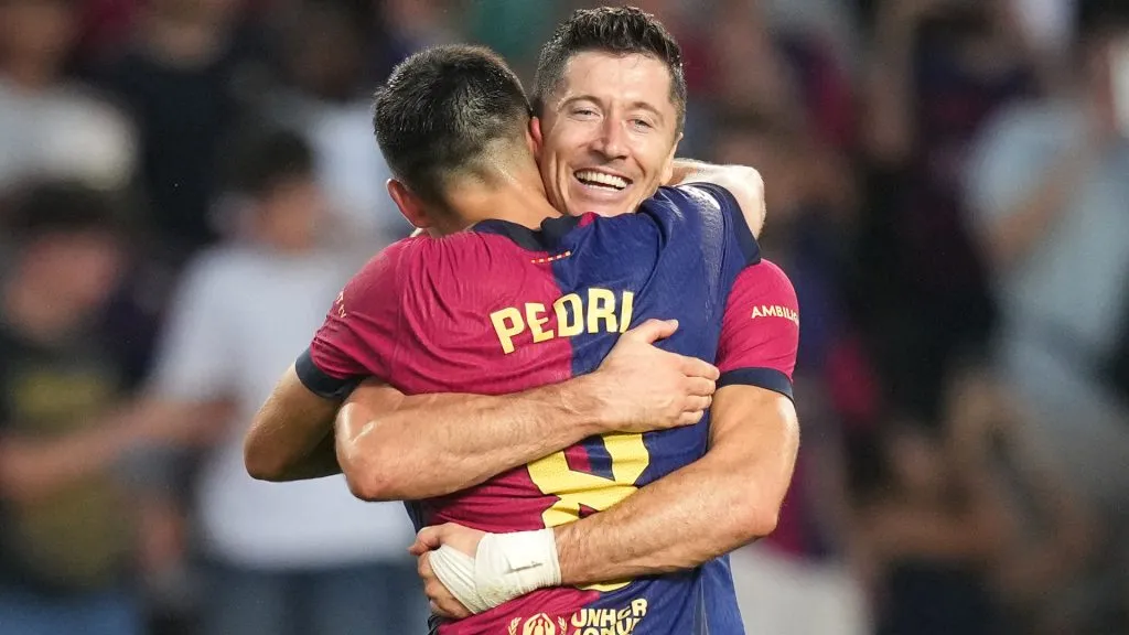 Robert Lewandowski of FC Barcelona celebrates scoring his team’s second goal with teammate Pedri during the La Liga match between FC Barcelona and Athletic Club. Alex Caparros/Getty Images