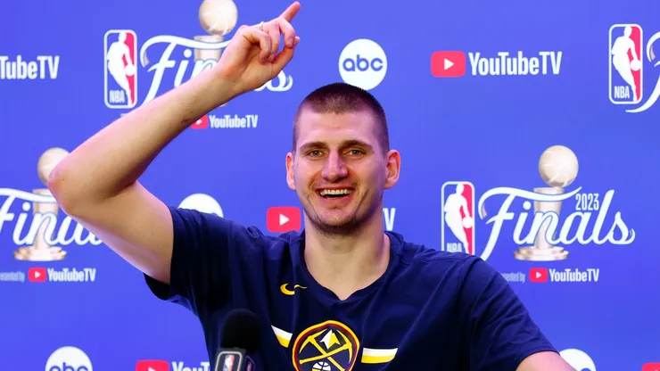 Nikola Jokic #15 of the Denver Nuggets speaks with media after a 94-89 victory against the Miami Heat in Game Five of the 2023 NBA Finals to win the NBA Championship at Ball Arena.