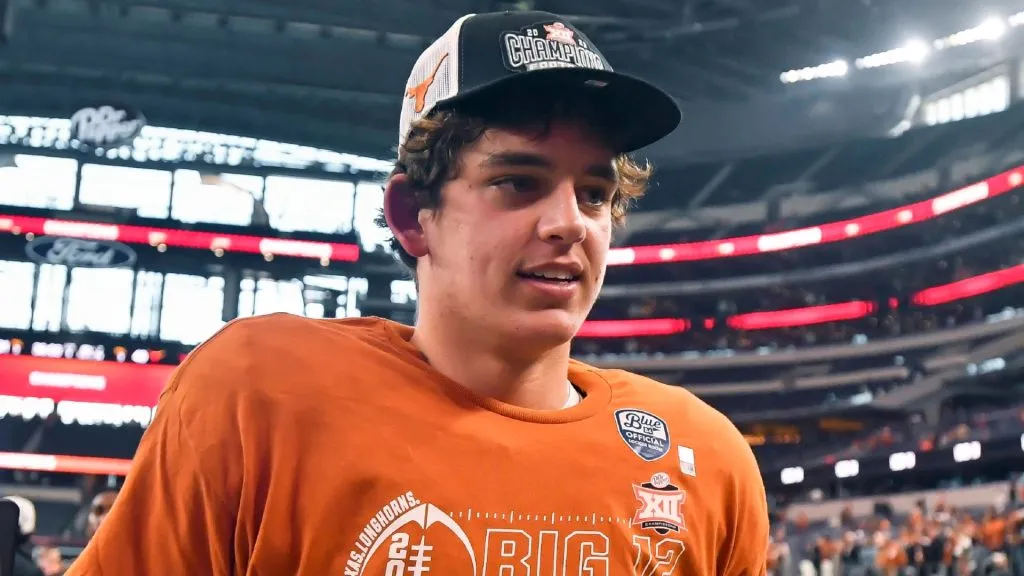 Texas Longhorns quarterback Arch Manning walks off the field after the Big 12 Conference Championship NCAA, College League, USA college football game against the Oklahoma State Cowboys at AT&amp;T Stadium in Arlington, TX.