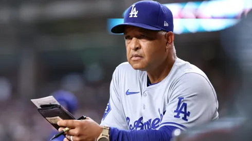 Manager Dave Roberts #30 of the Los Angeles Dodgers watches the action during the eighth inning against the Arizona Diamondbacks at Chase Field on September 02, 2024 in Phoenix, Arizona.