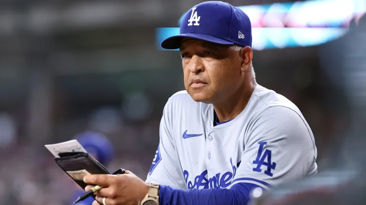Manager Dave Roberts #30 of the Los Angeles Dodgers watches the action during the eighth inning against the Arizona Diamondbacks at Chase Field on September 02, 2024 in Phoenix, Arizona.