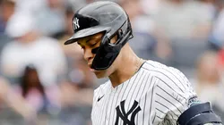 Aaron Judge #99 of the New York Yankees walks back to the dugout after striking out during the sixth inning against the St. Louis Cardinals at Yankee Stadium on August 31, 2024 in New York City.