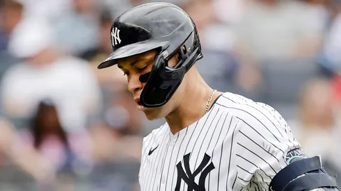 Aaron Judge #99 of the New York Yankees walks back to the dugout after striking out during the sixth inning against the St. Louis Cardinals at Yankee Stadium on August 31, 2024 in New York City.