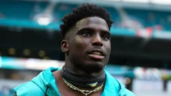 Tyreek Hill #10 of the Miami Dolphins looks on prior to a preseason game against the Atlanta Falcons at Hard Rock Stadium on August 09, 2024 in Miami Gardens, Florida.