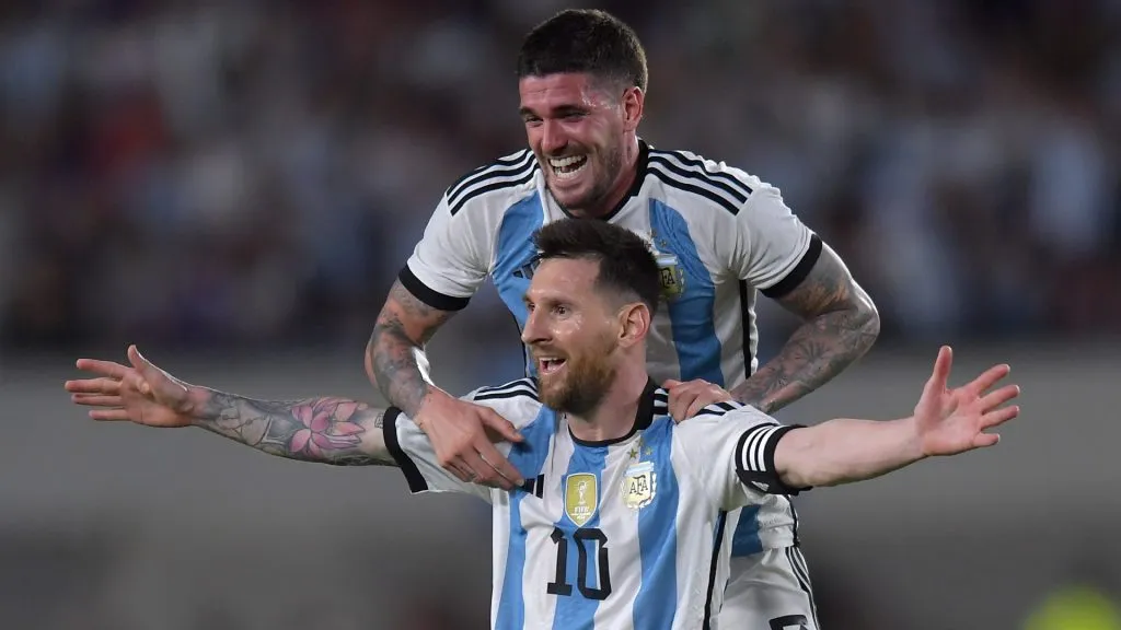 Lionel Messi of Argentina celebrates after scoring the team’s second goal with teammate Rodrigo De Paul. Marcelo Endelli/Getty Images
