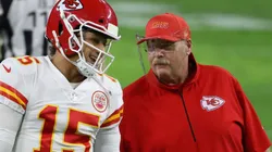 Quarterback Patrick Mahomes #15 of the Kansas City Chiefs talks with head coach Andy Reid before the NFL game against the Las Vegas Raiders at Allegiant Stadium on November 22, 2020 in Las Vegas, Nevada. The Chiefs defeated the Raiders 35-31.