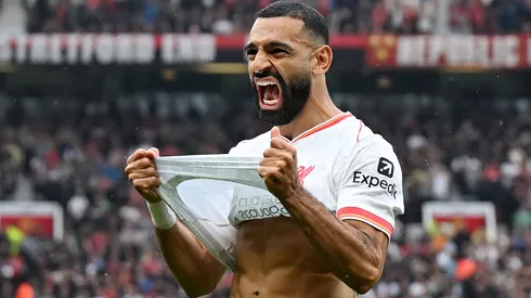 Mohamed Salah of Liverpool celebrates scoring his team's third goal during the Premier League match between Manchester United FC and Liverpool FC at Old Trafford on September 01, 2024 in Manchester, England.