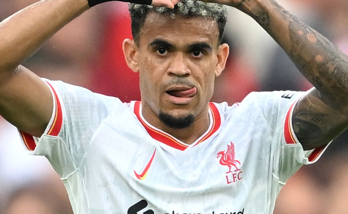 Why does the Nike logo look different in Liverpool's away jersey ...