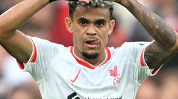 Luis Diaz of Liverpool celebrates scoring his team's first goal during the Premier League match between Manchester United FC and Liverpool FC at Old Trafford on September 01, 2024 in Manchester, England.