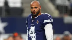 Dak Prescott #4 of the Dallas Cowboys looks on while warming up before a game against the Detroit Lions at AT&T Stadium on October 13, 2024.
