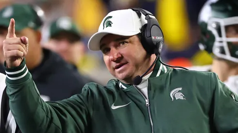 Head coach Jonathan Smith of the Michigan State Spartans reacts during the third quarter against the Michigan Wolverines at Michigan Stadium on October 26, 2024 in Ann Arbor, Michigan.