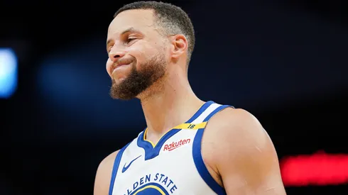Stephen Curry #30 of the Golden State Warriors grimaces on the court between plays in the fourth quarter against the Los Angeles Clippers at Chase Center on October 27, 2024 in San Francisco, California.