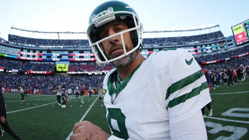 Aaron Rodgers #8 of the New York Jets walks off the field after the game against the New England Patriots at Gillette Stadium on October 27, 2024 in Foxborough, Massachusetts.