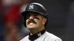 Austin Wells #28 of the New York Yankees reacts after a strikeout in the fifth inning against the Cleveland Guardians during Game Four of the American League Championship Series at Progressive Field on October 18, 2024 in Cleveland, Ohio.