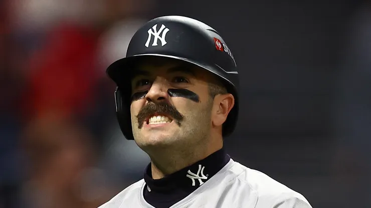 Austin Wells #28 of the New York Yankees reacts after a strikeout in the fifth inning against the Cleveland Guardians during Game Four of the American League Championship Series at Progressive Field on October 18, 2024 in Cleveland, Ohio.