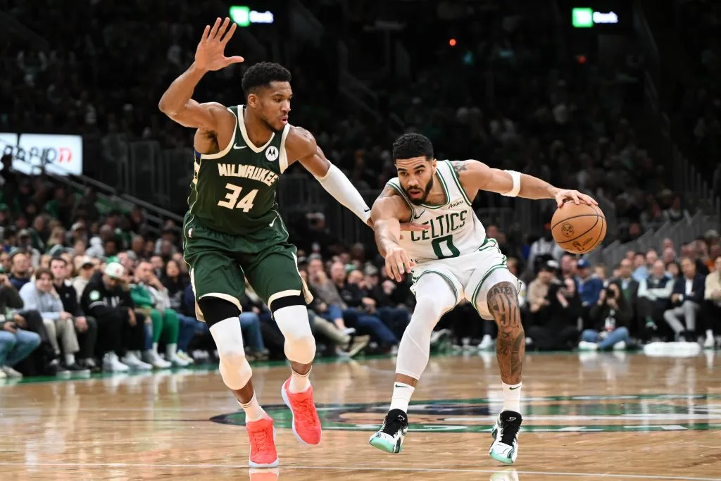 Jayson Tatum #0 of the Boston Celtics drives to the basket against Giannis Antetokounmpo #34 of the Milwaukee Bucks during the second half at the TD Garden. Brian Fluharty/Getty Images