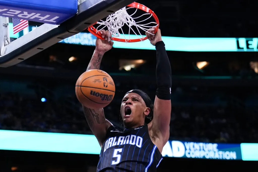 Paolo Banchero #5 of the Orlando Magic dunks the ball against the Indiana Pacers during the first quarter. Rich Storry/Getty Images