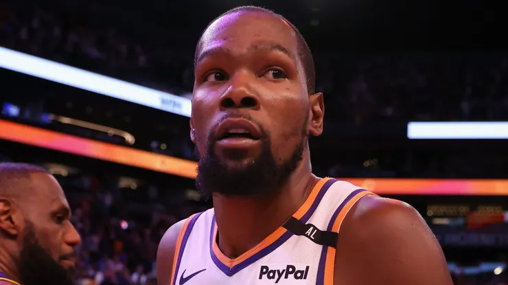 Kevin Durant #35 of the Phoenix Suns greets LeBron James #23 of the Los Angeles Lakers following the NBA game at Footprint Center on October 28, 2024 in Phoenix, Arizona. The Suns defeated the Lakers 109-105.