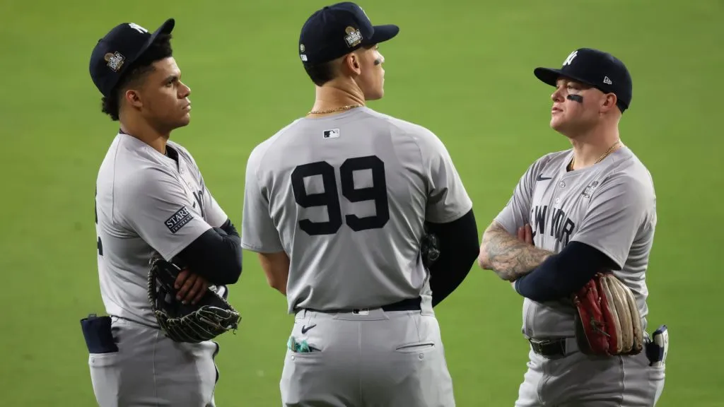 Juan Soto #22, Aaron Judge #99 and Alex Verdugo #24 of the New York Yankees are seen as they play the Los Angeles Dodgers, in the 2024 World Series at Dodger Stadium on October 26, 2024 in Los Angeles, California. (Photo by Steph Chambers/Getty Images)