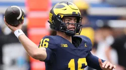 Davis Warren #16 of the Michigan Wolverines throws a pass during the second quarter against the Texas Longhorns at Michigan Stadium on September 07, 2024 in Ann Arbor, Michigan.