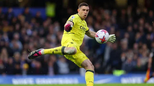 Emiliano Martinez of Aston Villa kicks the ball upfield during the Premier League match between Chelsea FC and Aston Villa at Stamford Bridge on April 01, 2023 in London, England. (Photo by Marc Atkins/Getty Images)