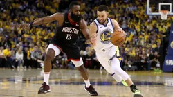 James Harden #13 of the Houston Rockets guards Stephen Curry #30 of the Golden State Warriors during Game Five of the Western Conference Semifinals of the 2019 NBA Playoffs at ORACLE Arena on May 08, 2019 in Oakland, California.