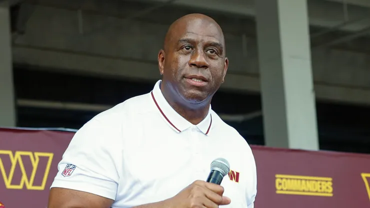 Earvin 'Magic' Johnson, a new owner of the Washington Commanders, greets fans at a pep rally after a press conference introducing the team's new ownership at on July 21, 2023 in Landover, Maryland. NFL teams owners have unanimously approved a $6.05 billion sale of the Commanders from Dan Snyder to a group led by Josh Harris.