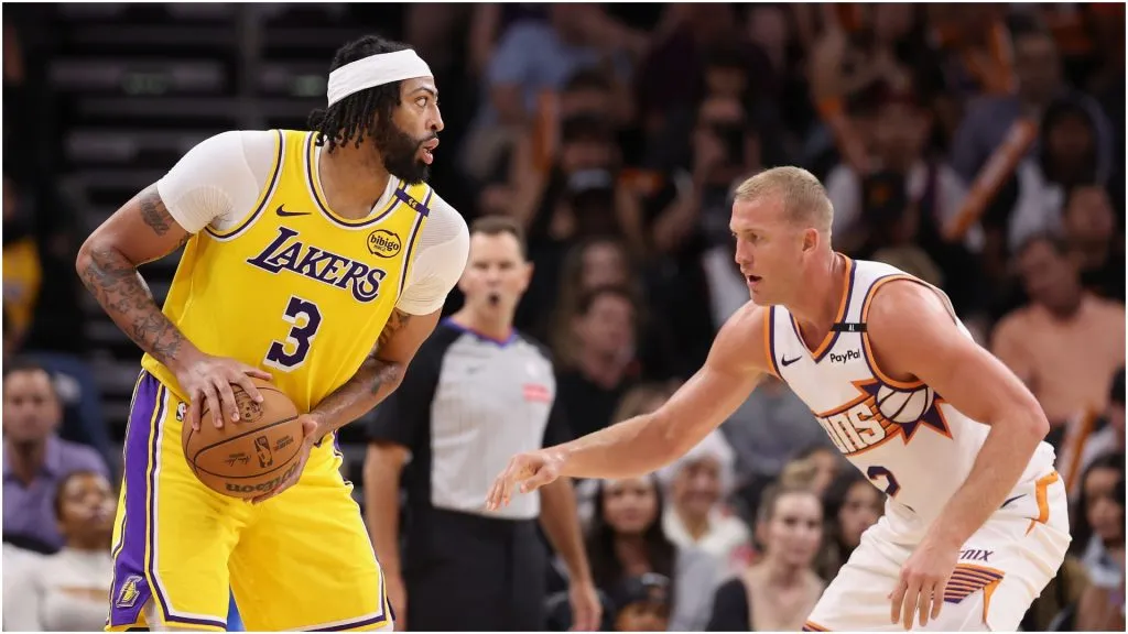 Anthony Davis of the Los Angeles Lakers handles the ball against Mason Plumlee of the Phoenix ā Christian Petersen/Getty Images