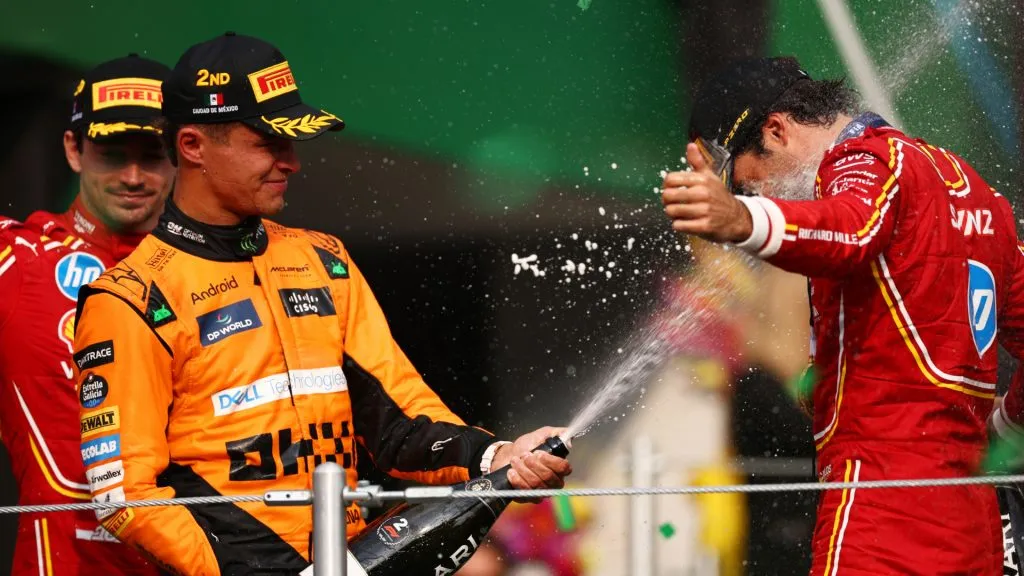 Race winner Carlos Sainz of Spain and Ferrari and Second placed Lando Norris of Great Britain and McLaren celebrate on the podium (Jared C. Tilton/Getty Images)