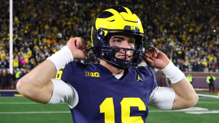 Davis Warren #16 of the Michigan Wolverines looks on after defeating the Michigan State Spartans 24-17 at Michigan Stadium on October 26, 2024 in Ann Arbor, Michigan.