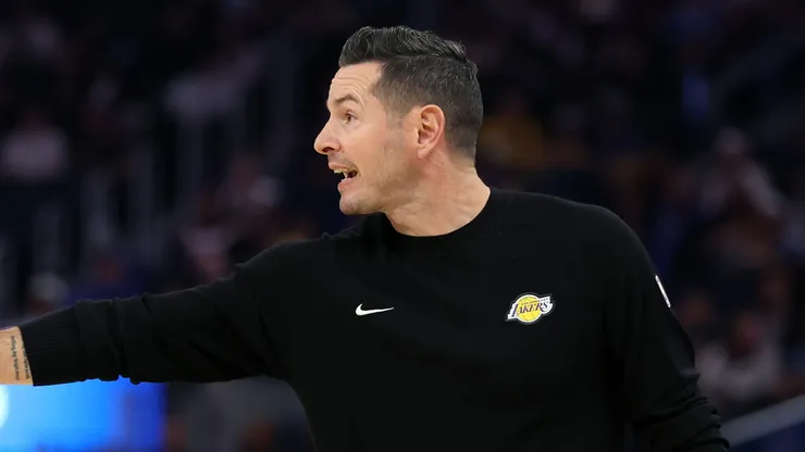 Los Angeles Lakers head coach JJ Redick talks to his team during the first half of their preseason game against the Golden State Warriors at Chase Center on October 18, 2024 in San Francisco, California.