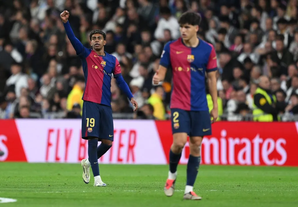 MADRID, SPAIN – OCTOBER 26: Lamine Yamal of FC Barcelona celebrates scoring his team’s third goal during the LaLiga match between Real Madrid CF and FC Barcelona at Estadio Santiago Bernabeu on October 26, 2024 in Madrid, Spain. (Photo by David Ramos/Getty Images)