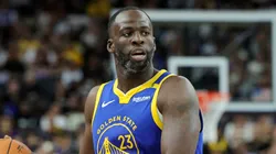 Draymond Green #23 of the Golden State Warriors brings the ball up the court against the Los Angeles Lakers.