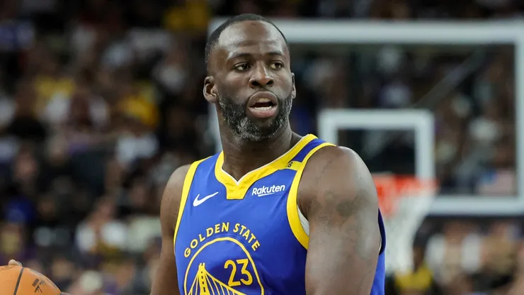 Draymond Green #23 of the Golden State Warriors brings the ball up the court against the Los Angeles Lakers.