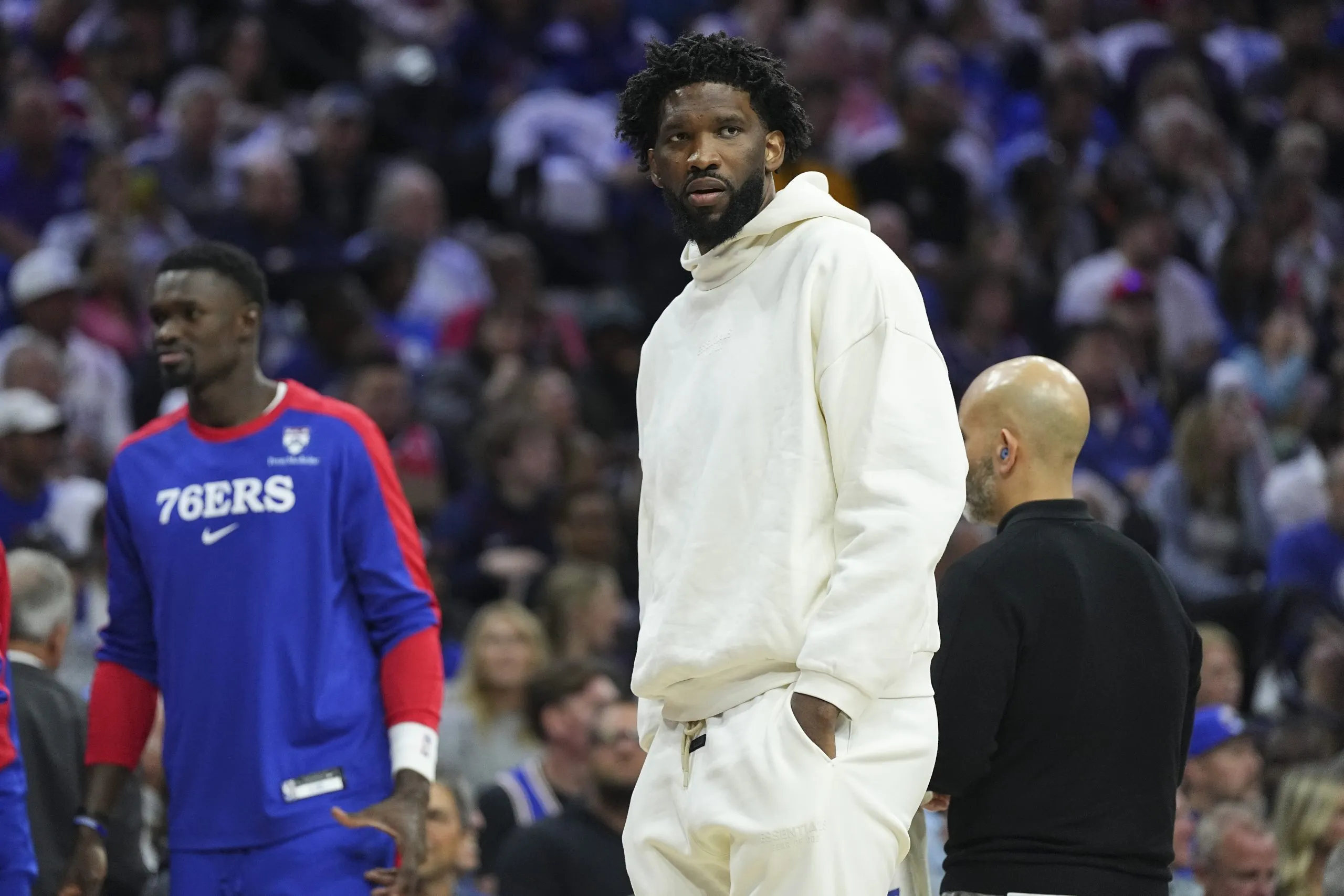 Joel Embiid #21 of the Philadelphia 76ers looks on during a timeout against the Milwaukee Bucks in the first half at the Wells Fargo Center. Mitchell Leff/Getty Images