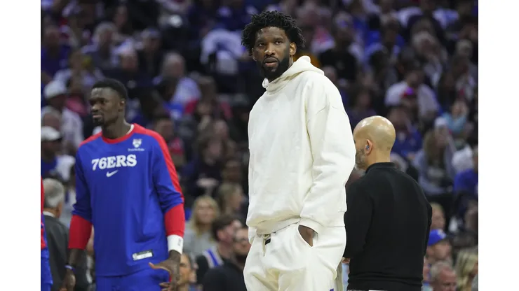 PHILADELPHIA, PENNSYLVANIA - OCTOBER 23: Joel Embiid #21 of the Philadelphia 76ers looks on during a timeout against the Milwaukee Bucks in the first half at the Wells Fargo Center on October 23, 2024 in Philadelphia, Pennsylvania. NOTE TO USER: User expressly acknowledges and agrees that, by downloading and/or using this photograph, user is consenting to the terms and conditions of the Getty Images License Agreement. (Photo by Mitchell Leff/Getty Images)