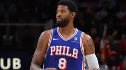 Paul George #8 of the Philadelphia 76ers brings the ball up the court against the Atlanta Hawks during the second quarter at State Farm Arena on October 14, 2024 in Atlanta, Georgia.